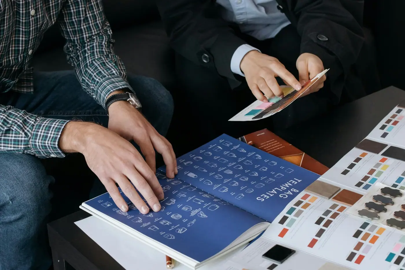 Board members reviewing a briefing document together